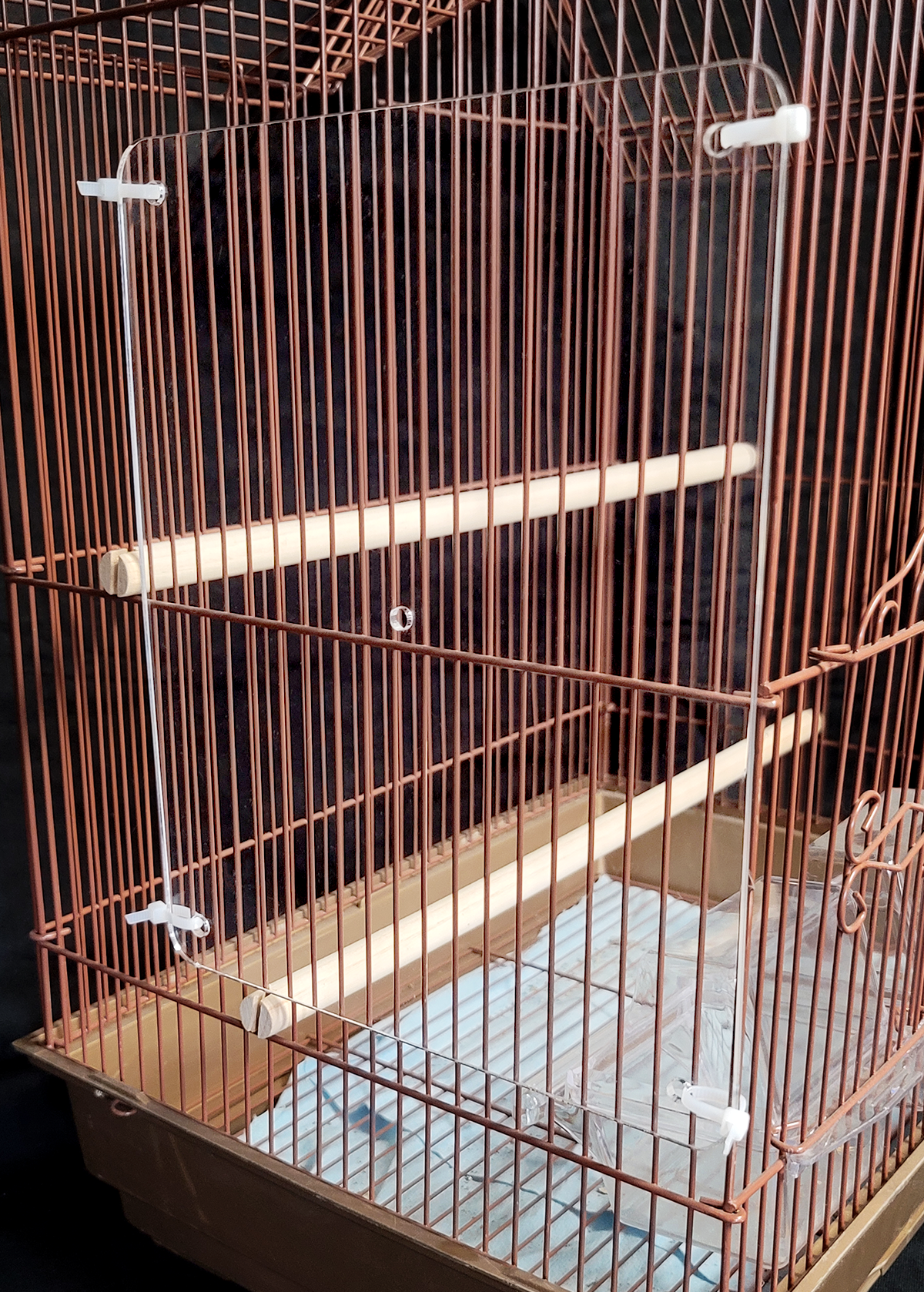 The Large Seed Guard for caged birds and pets.